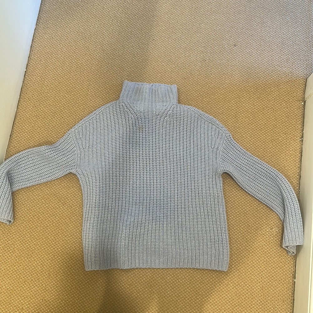 Vince light blue turtle neck size large. Little discoloration on the front